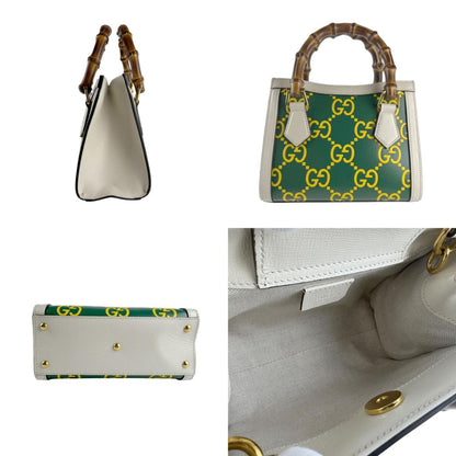 Gucci Others Green Handbags