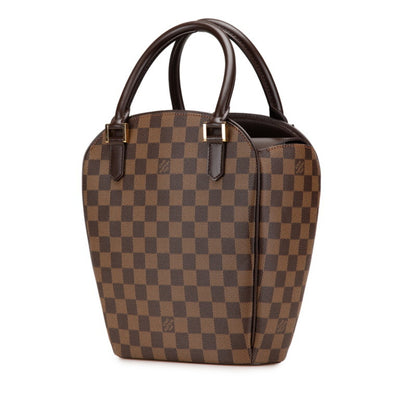 Louis Vuitton Pvc Brown Handbags