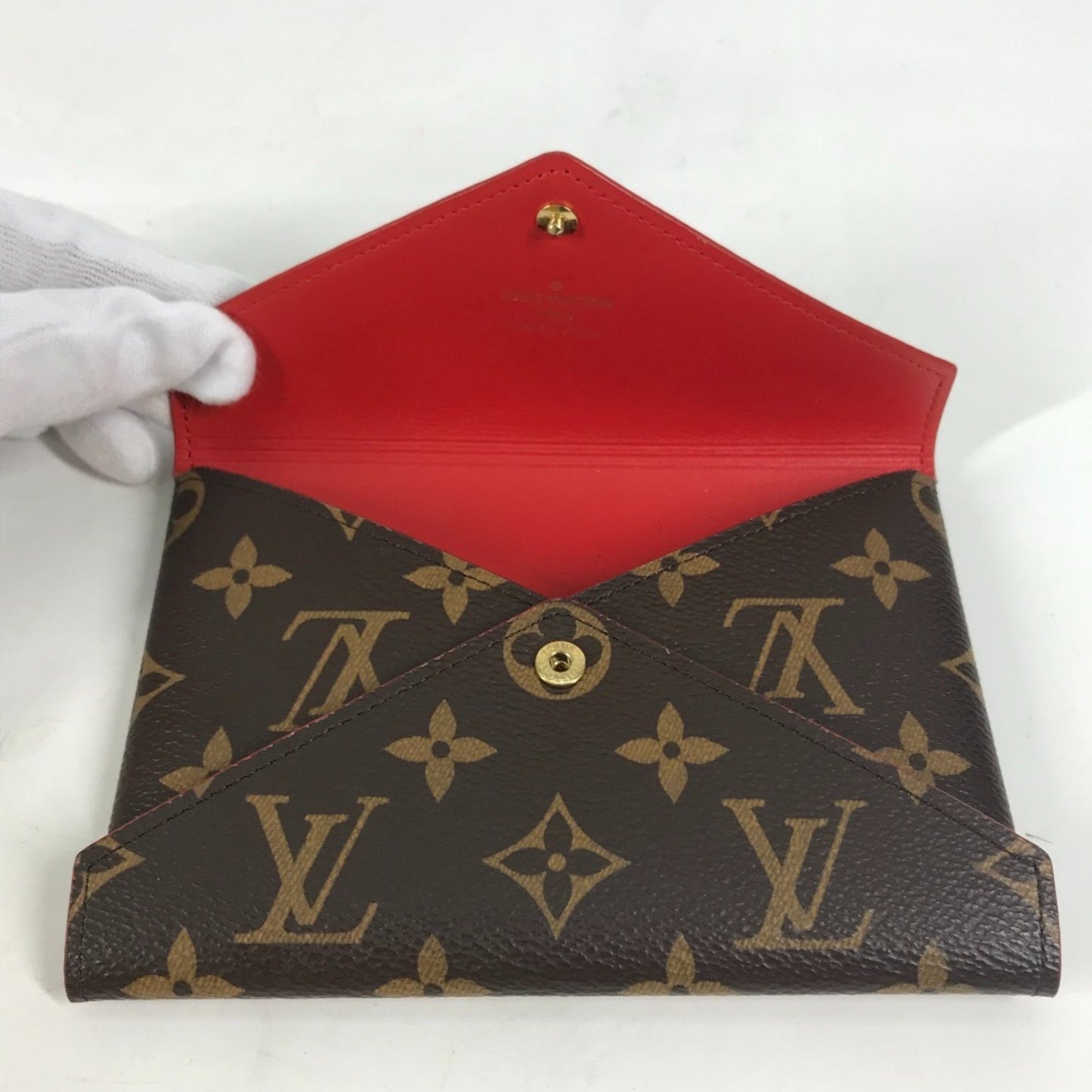 Louis Vuitton Monogram Canvas Brown Clutch Bags