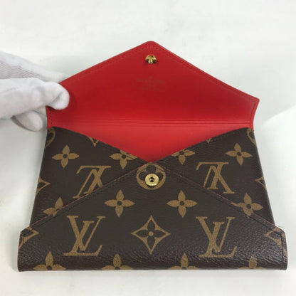 Louis Vuitton Monogram Canvas Brown Clutch Bags