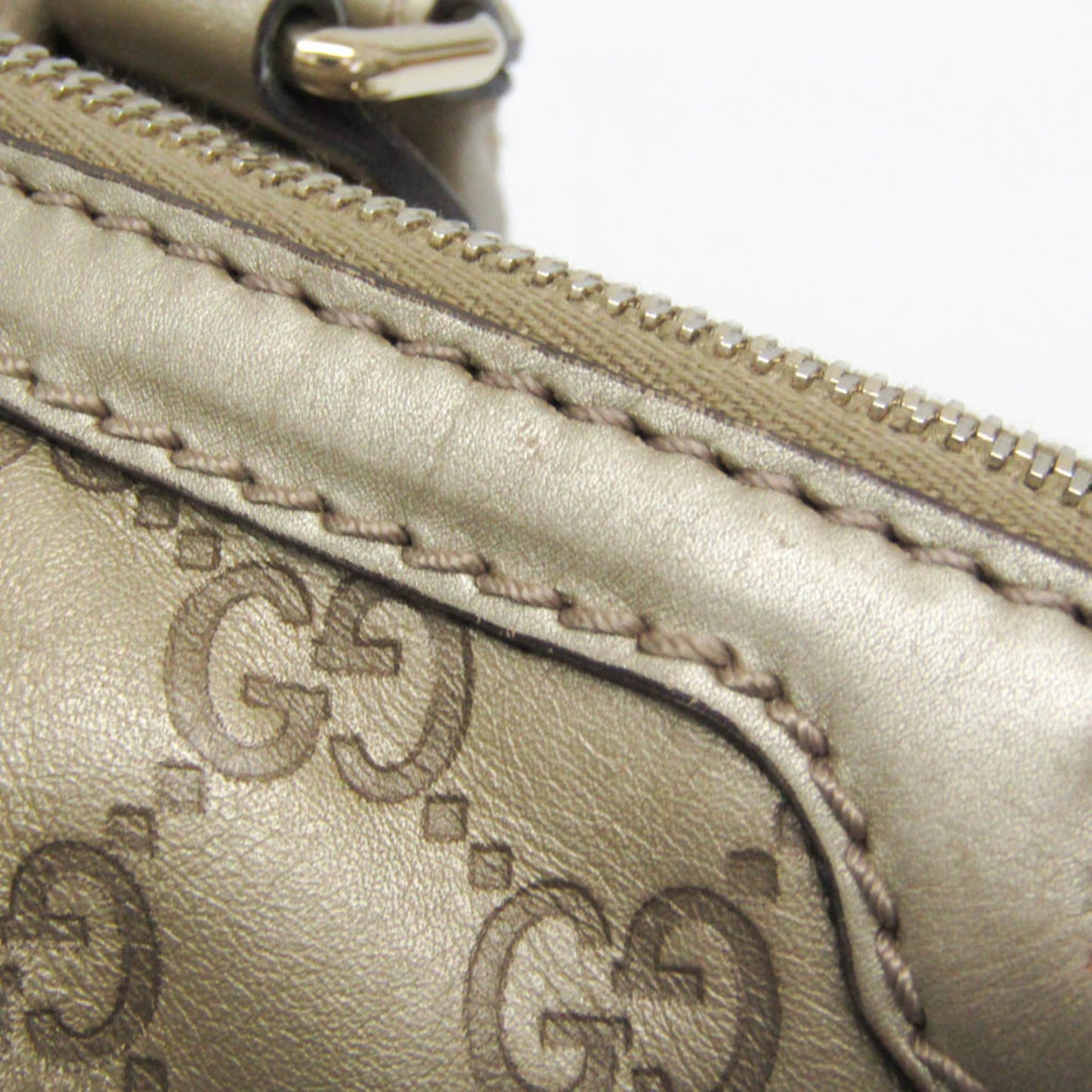 Gucci Others Gold Handbags