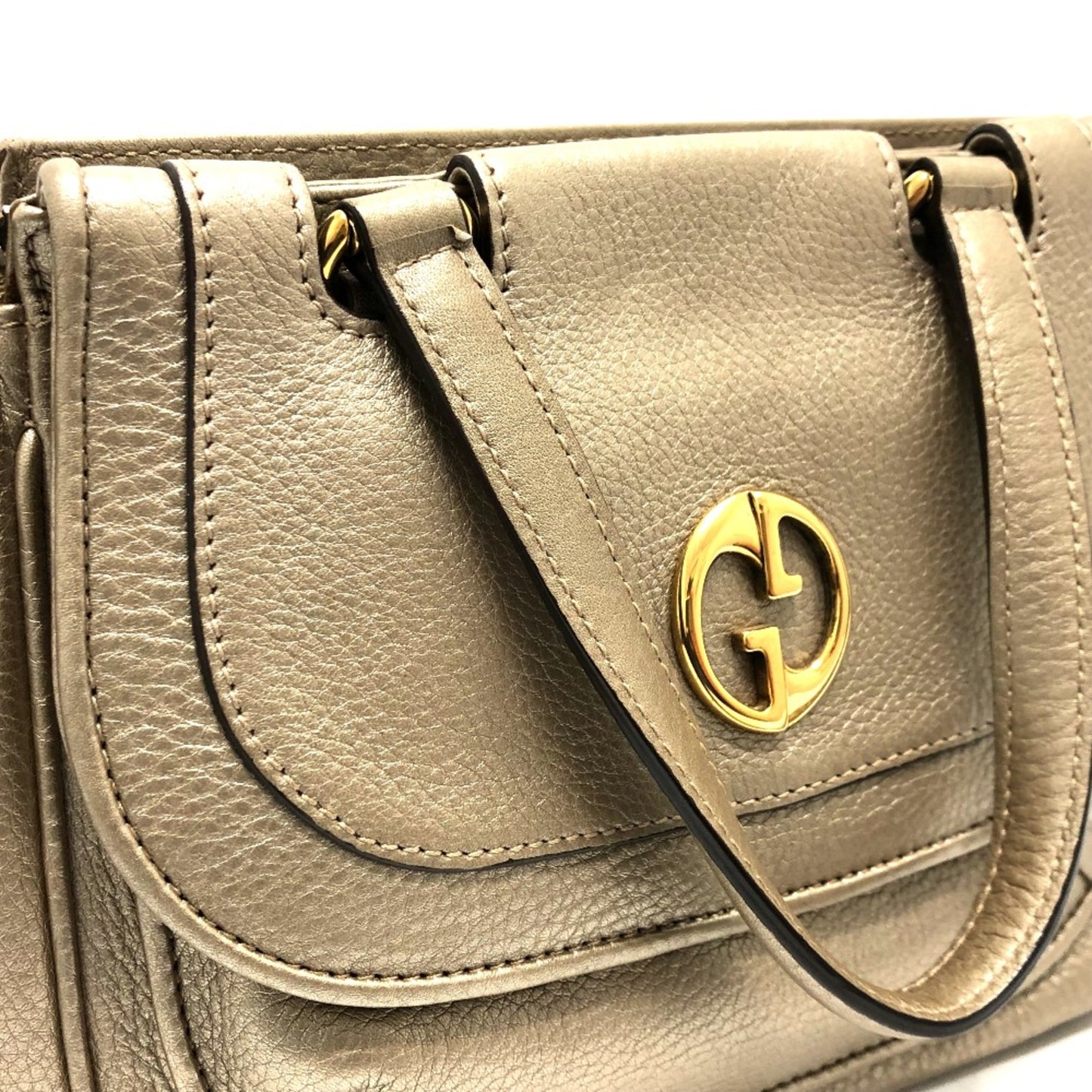Gucci Others Gold Handbags