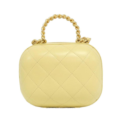 Chanel Others Yellow Handbags