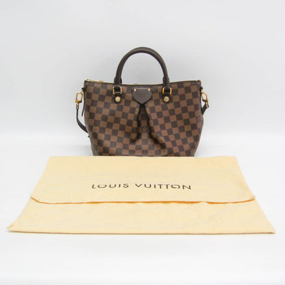Louis Vuitton Monogram Canvas Brown Handbags