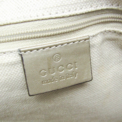 Gucci Others Gold Handbags