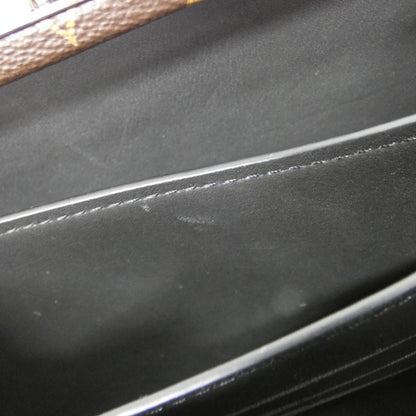 Louis Vuitton Coated Canvas Brown Clutch Bags