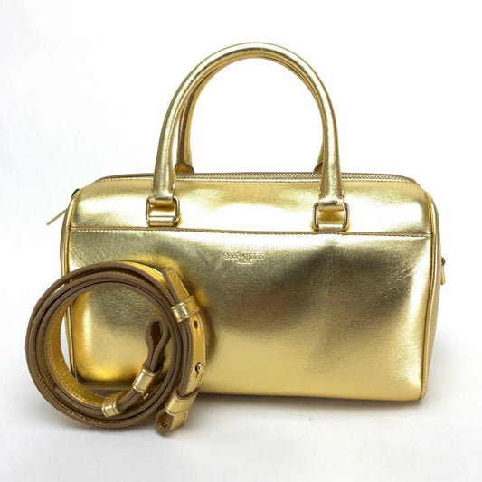 Saint Laurent Others Gold Handbags
