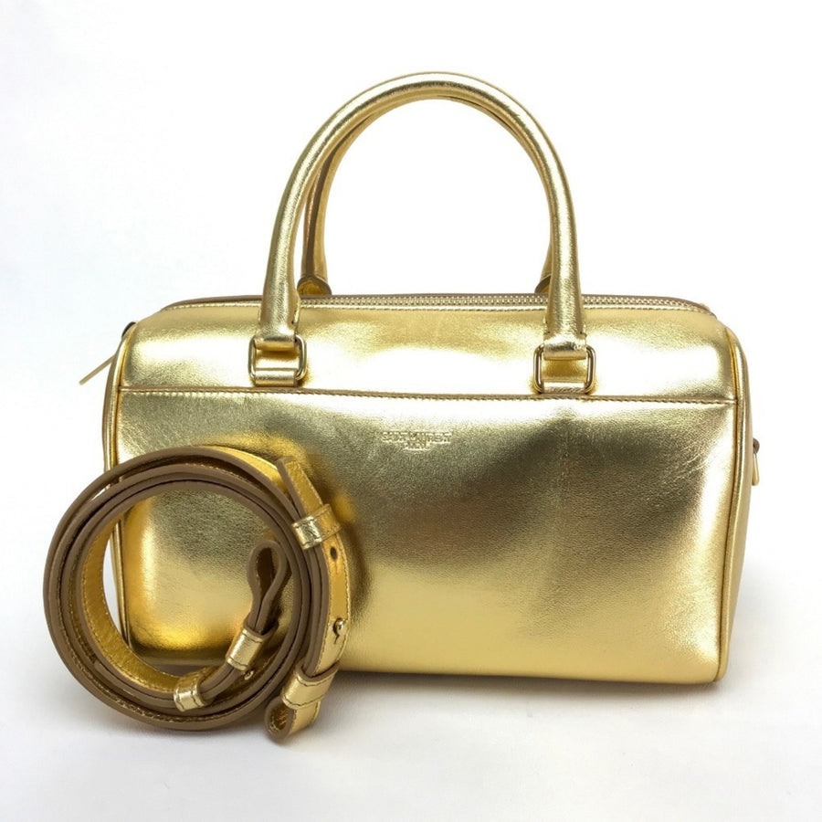 Saint Laurent Others Gold Handbags