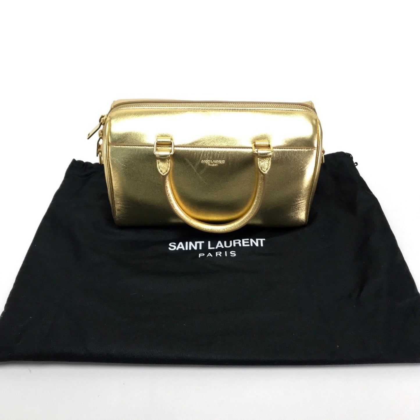 Saint Laurent Others Gold Handbags