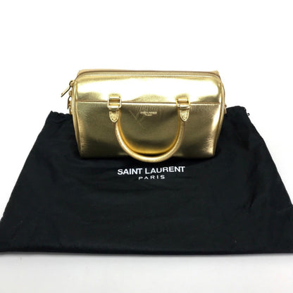 Saint Laurent Others Gold Handbags