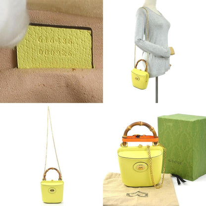 Gucci Others Yellow Handbags