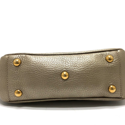 Gucci Others Gold Handbags