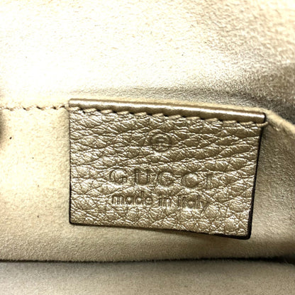 Gucci Others Gold Handbags