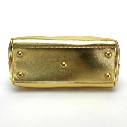 Saint Laurent Others Gold Handbags