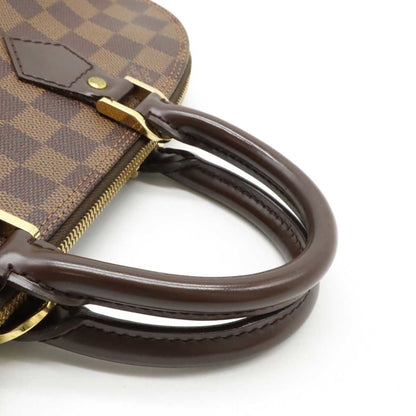 Louis Vuitton Monogram Canvas Brown Handbags