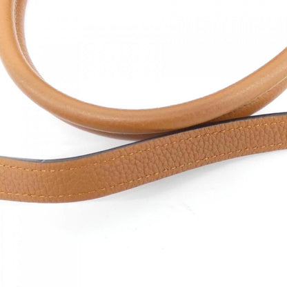 Louis Vuitton Others Gold Handbags