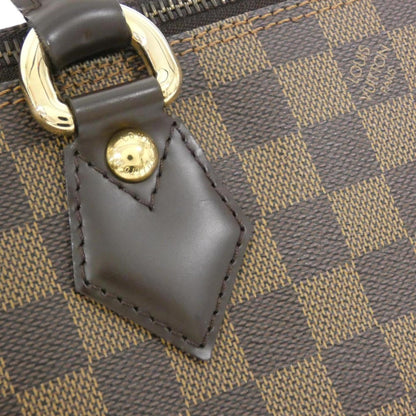 Louis Vuitton Coated Canvas Brown Handbags