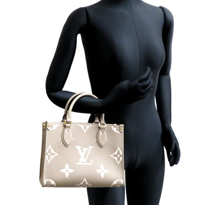Louis Vuitton Empreinte Gray Handbags