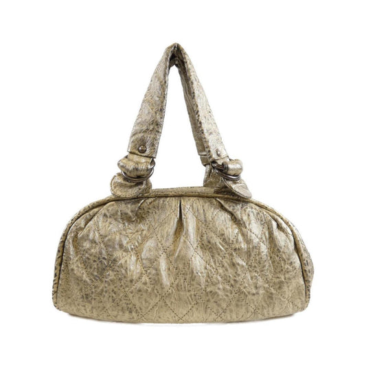 Chanel Others Gold Handbags