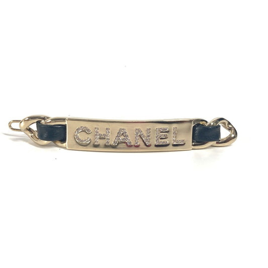 Chanel Other Metal Black Brooches