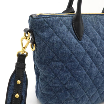 Prada Denim Black Handbags