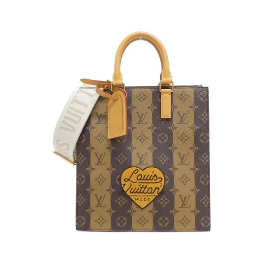 Louis Vuitton Coated Canvas Brown Handbags
