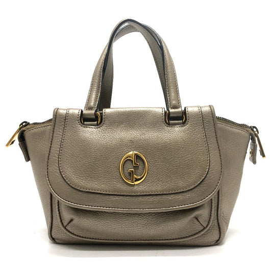 Gucci Others Gold Handbags