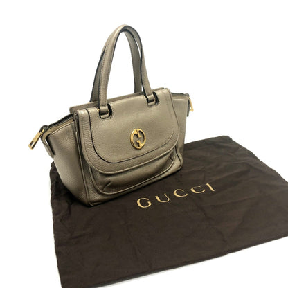 Gucci Others Gold Handbags