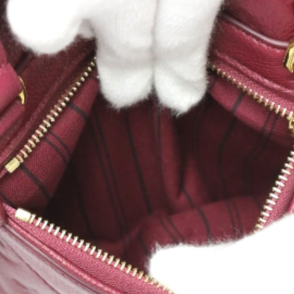 Louis Vuitton Empreinte Brown Handbags