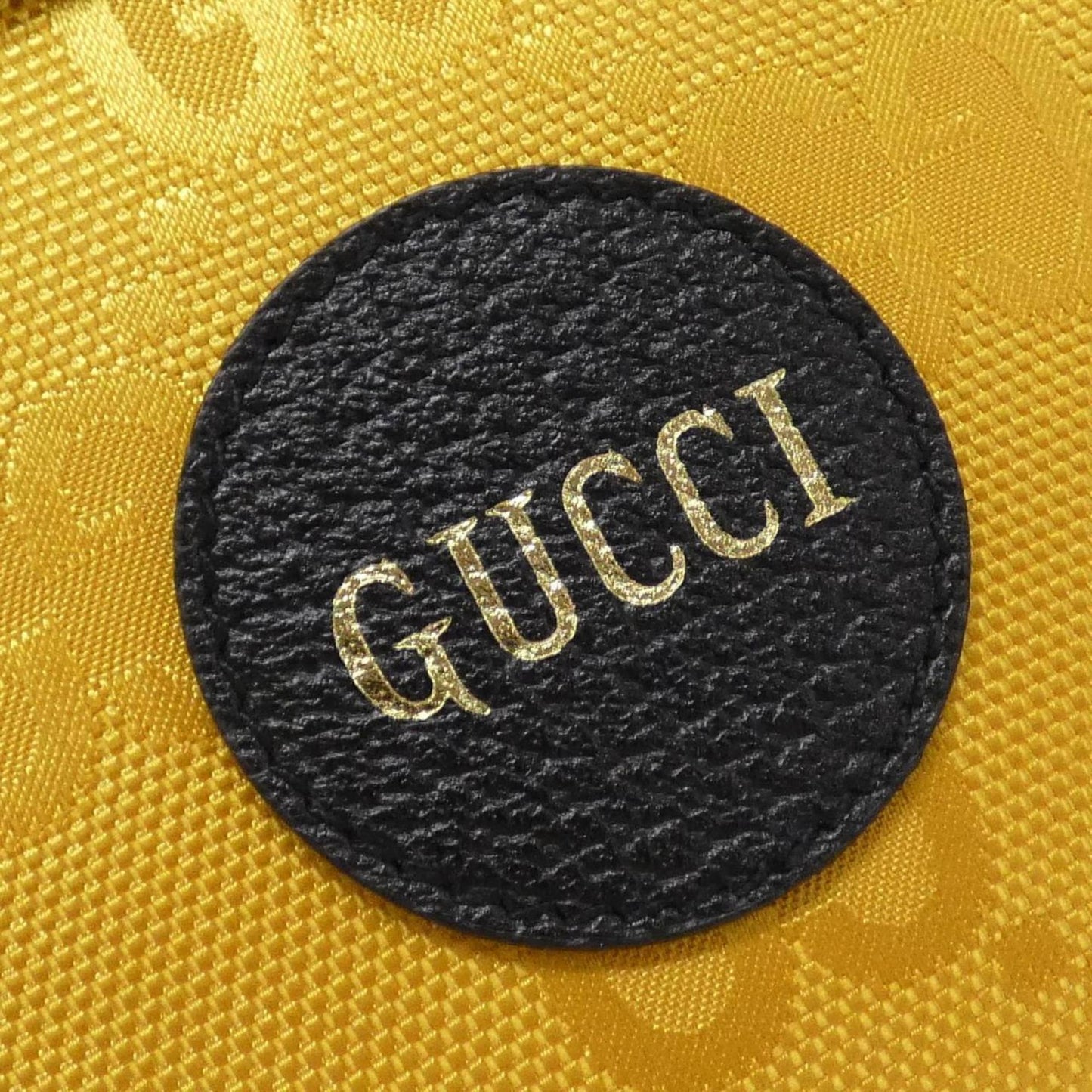 Gucci Nylon Yellow Handbags