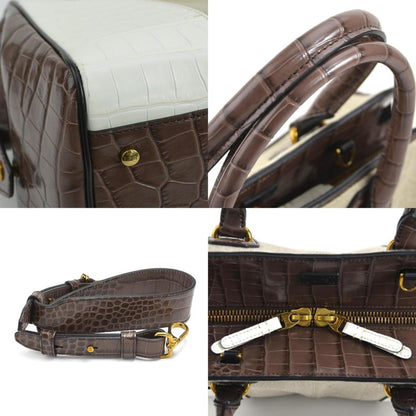 Tod's Canvas Brown Handbags