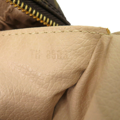 Louis Vuitton Monogram Canvas Brown Clutch Bags