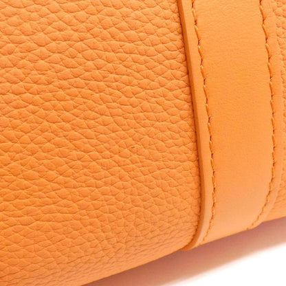 Louis Vuitton Others Orange Travel Bags