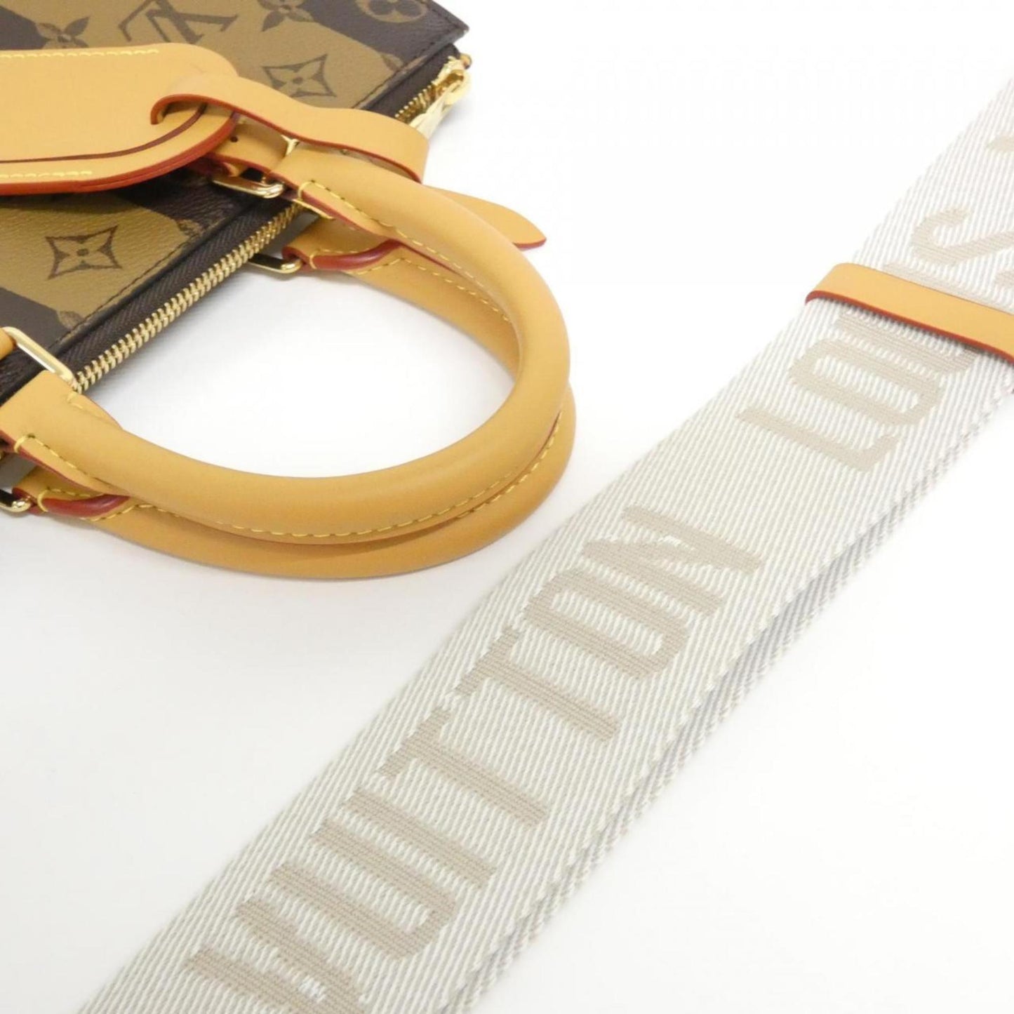 Louis Vuitton Coated Canvas Brown Handbags