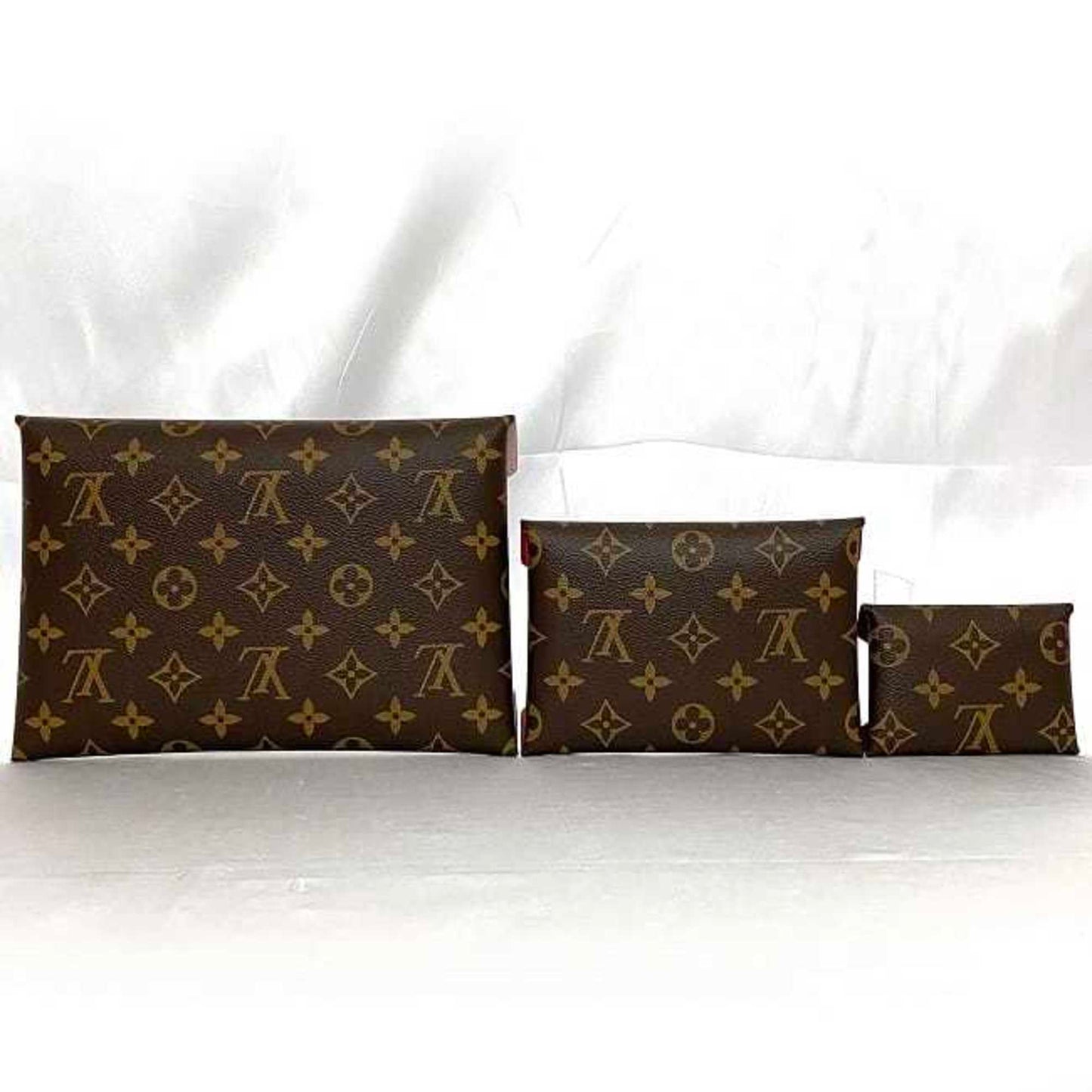 Louis Vuitton Monogram Canvas Red Clutch Bags
