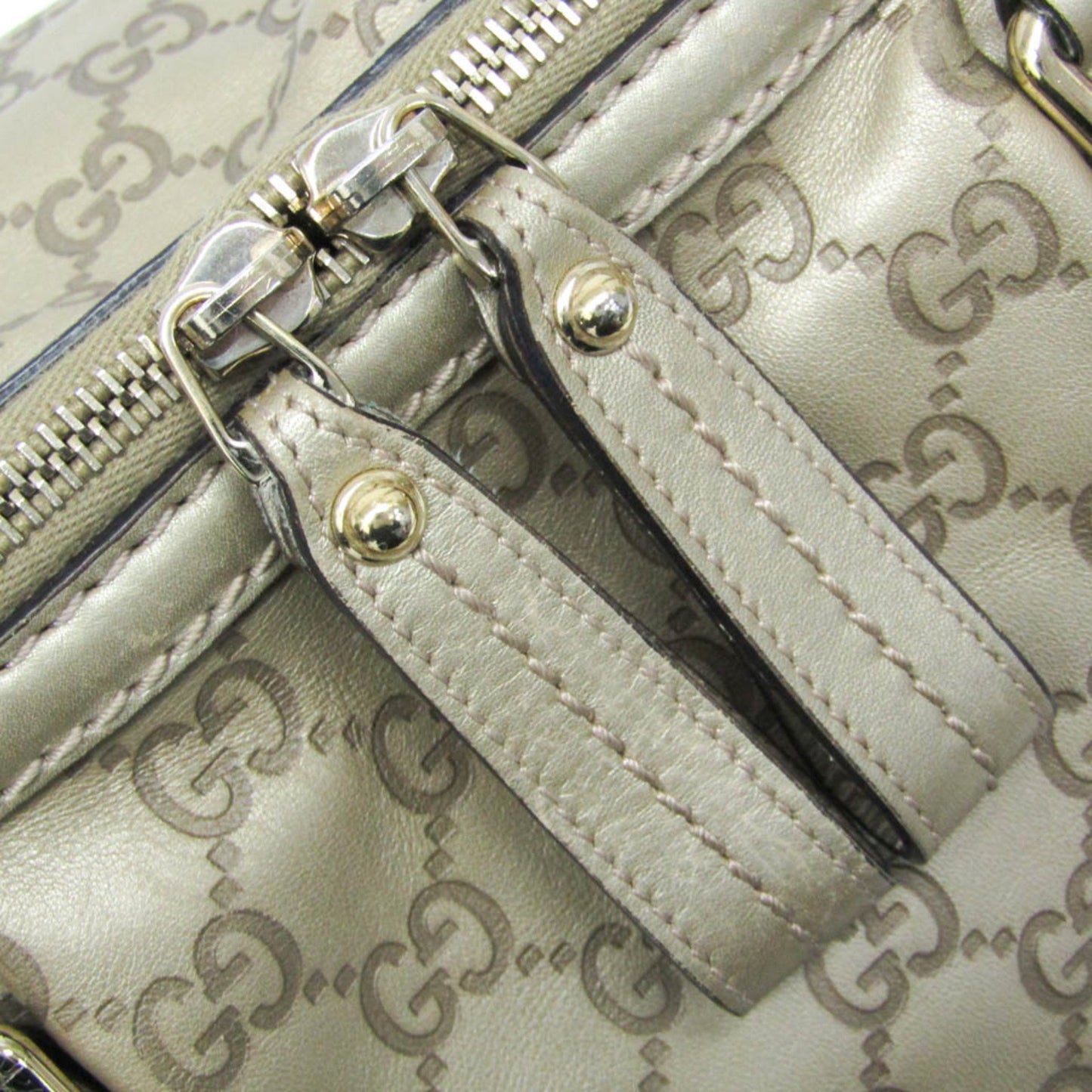 Gucci Others Gold Handbags