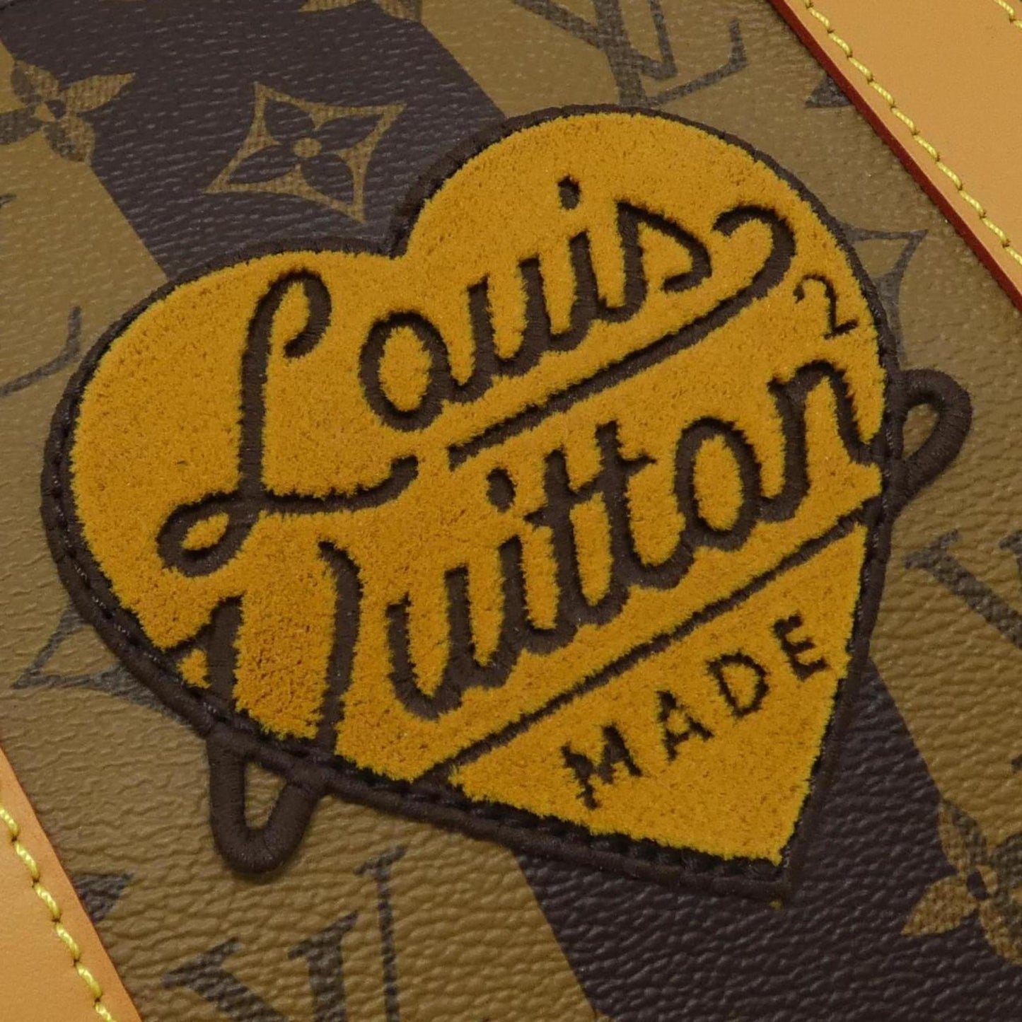 Louis Vuitton Coated Canvas Brown Travel Bags