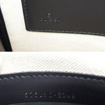 Gucci Coated Canvas Black Clutch Bags