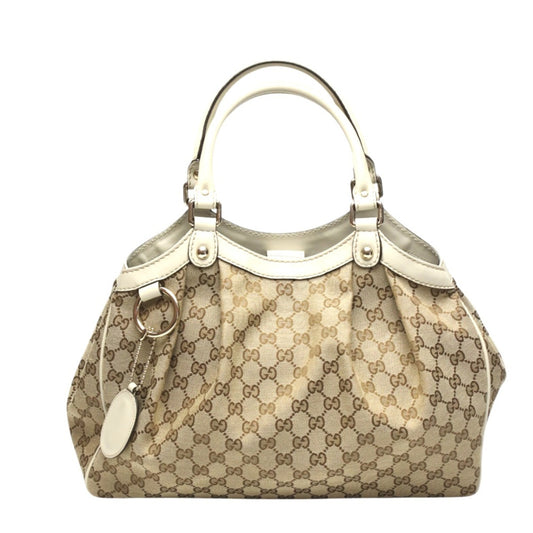 Gucci Canvas Brown Handbags