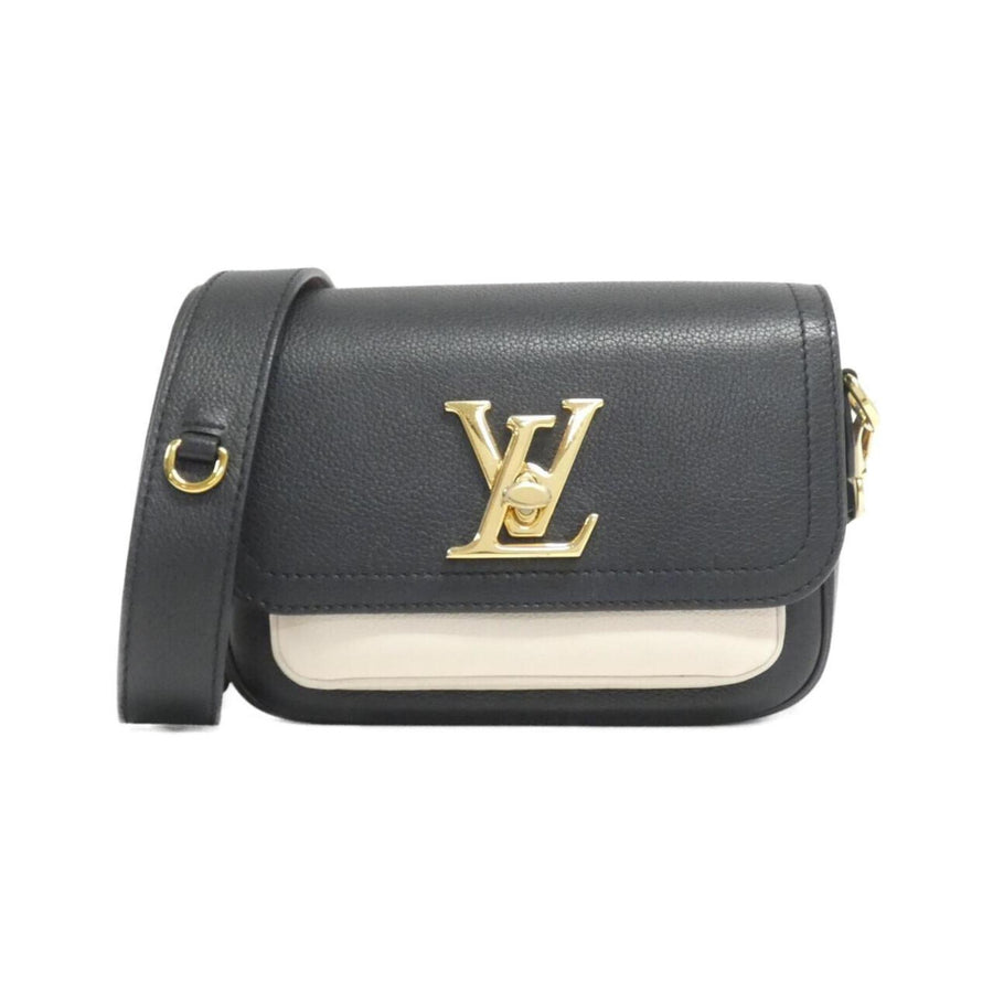 Louis Vuitton Elegant Leather Lockme Handbag with Metal Fittings and Minimal Wear