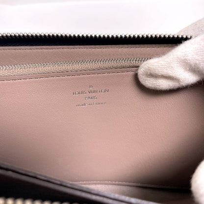 Louis Vuitton Black Leather Comete