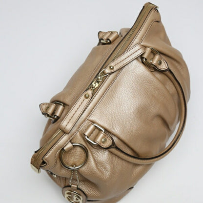 Gucci Gold Leather Sukey