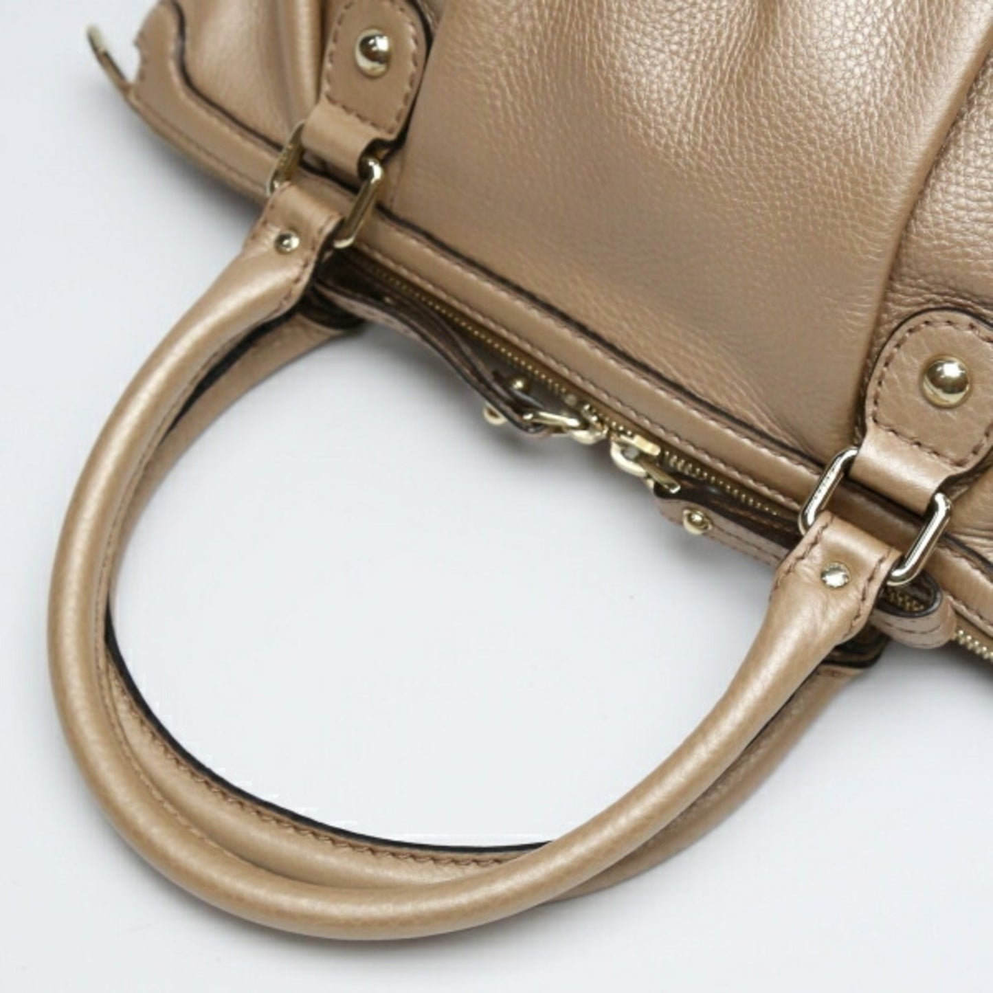 Gucci Gold Leather Sukey