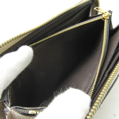 Louis Vuitton Brown Leather Comete