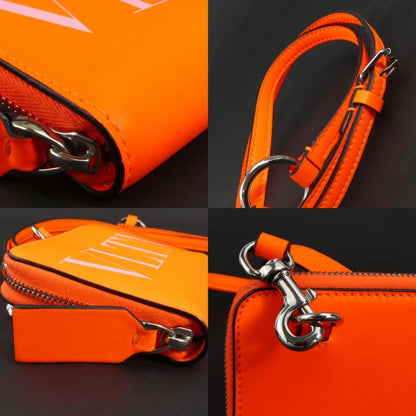 Valentino Garavani Orange Leather Vltn