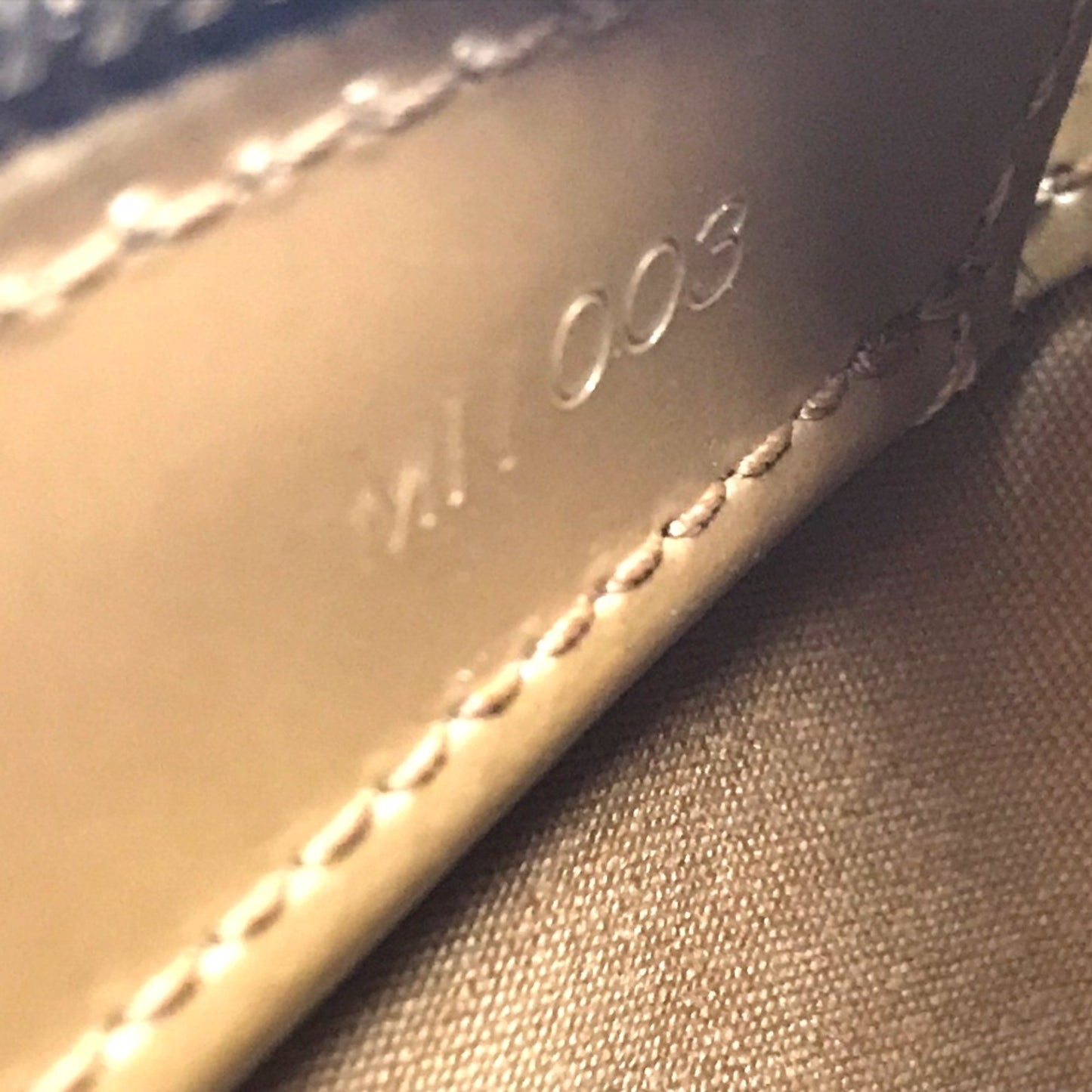 Louis Vuitton Gold Leather Fowler