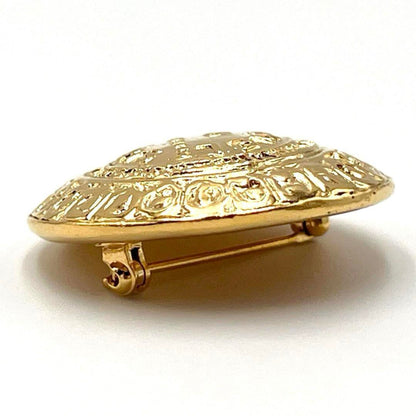 Chanel Gold Metal Cambon