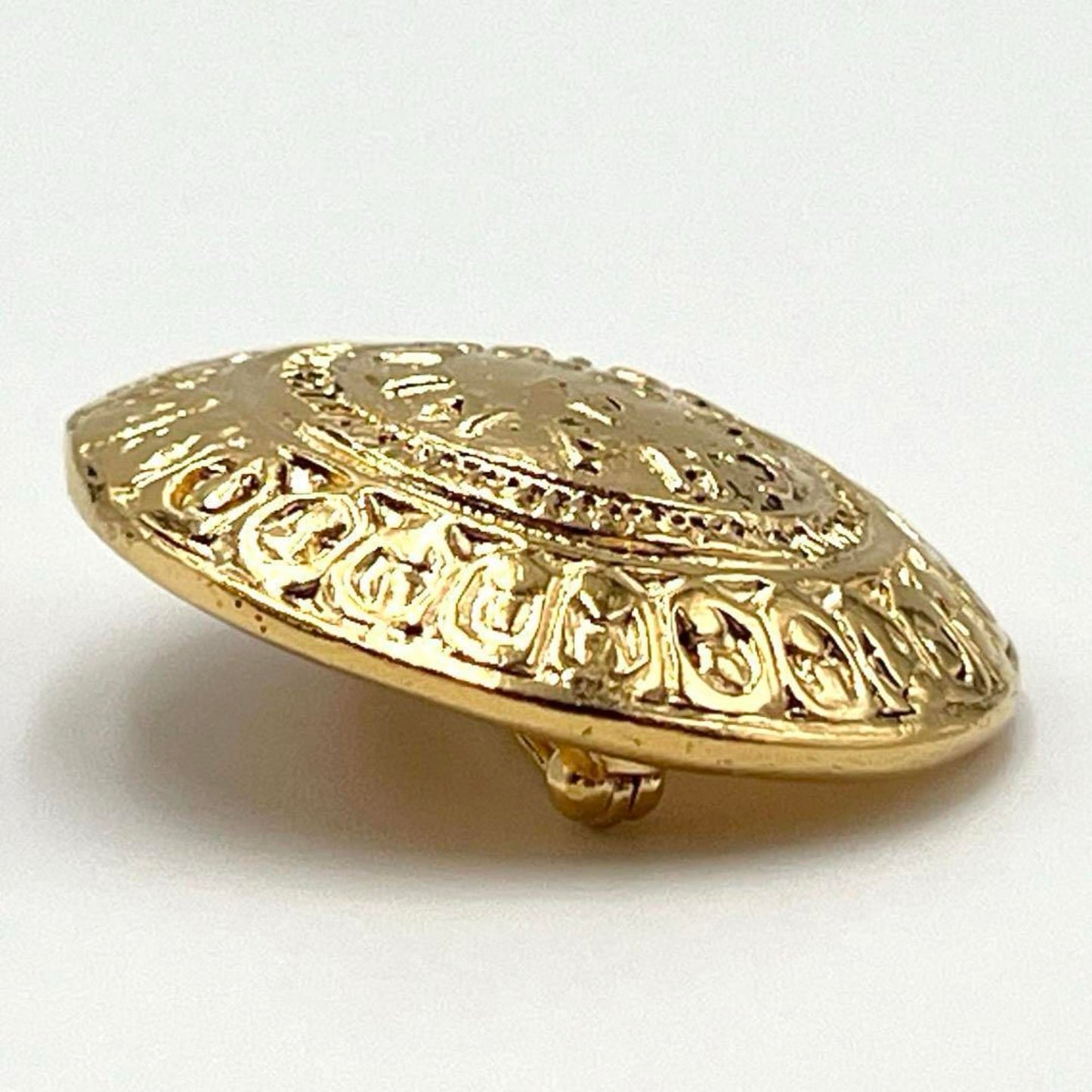 Chanel Gold Metal Cambon