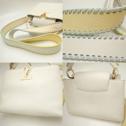 Louis Vuitton Gold Leather Handbag