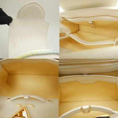 Louis Vuitton Gold Leather Handbag